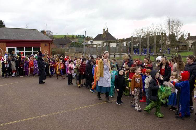 Children and staff enjoying the costume parade