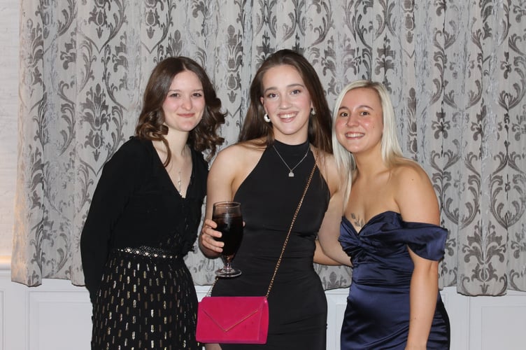 Three young ladies at the Bow YFC dinner and dance.  AQ 0647
