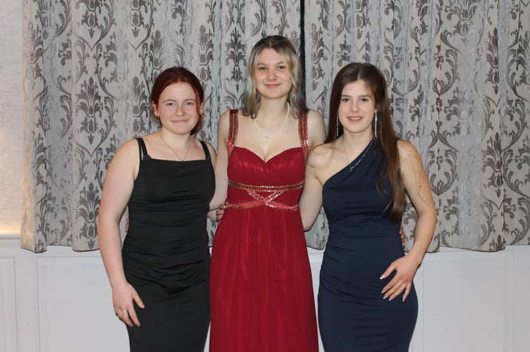 Three young ladies at the Bow YFC dinner and dance.  AQ 0659
