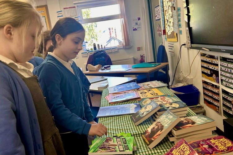 Yeoford Community Primary School children choosing titles