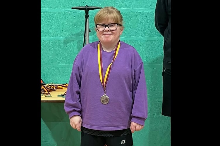 Dee Weiner with the medal she won at the SW Cornwall Disability Badminton Tournament.
