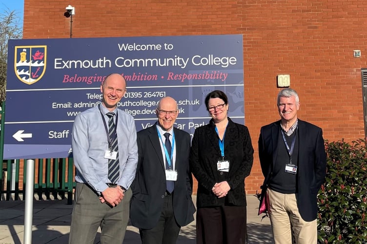 Exmouth Community College Headteacher Tom Inman, left, with Ted Wragg Trust CEO Moira Marder, second from right, and others
