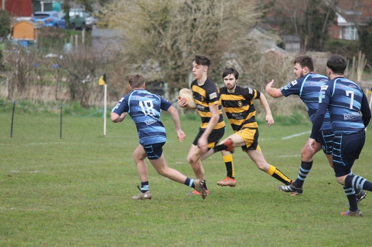 Crediton Thirds run with the ball during the game against Tiverton Thirds.  AQ 0707
