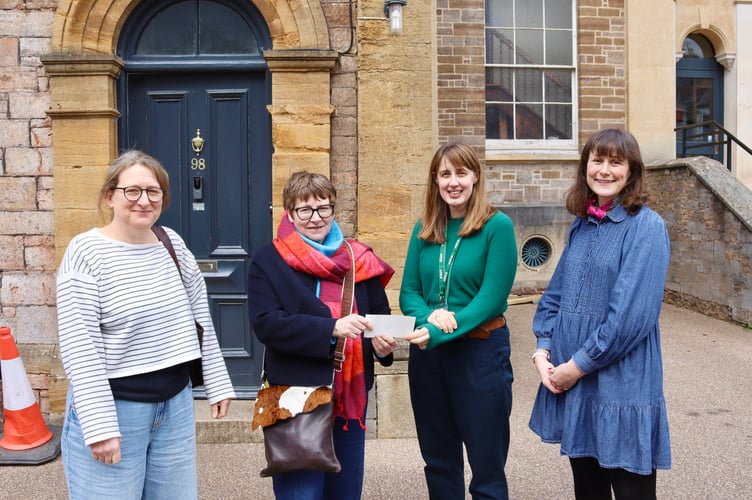From left, Hils Fry and Ruth Beckley of the former food festival committee with Helen Moores of Crediton Foodbank and Jo Davey of Crediton Town Council