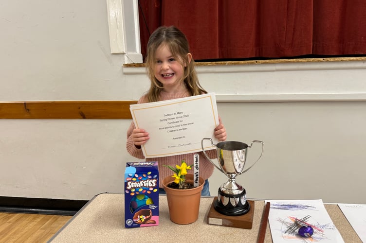 Flora Parkinson (5), won the Children’s Cup for the best home-grown item and for most points in the children’s section at Tedburn St Mary Spring Show.  AQ 5740
