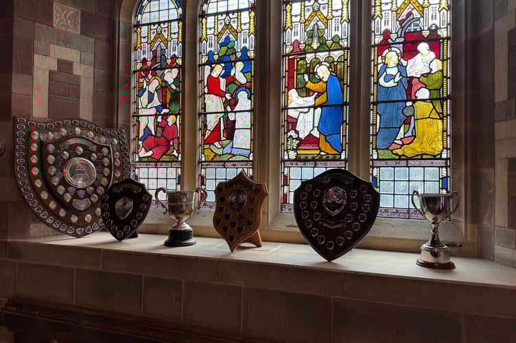 Bellringing trophies on display in Down St Mary church.  AQ 5638
