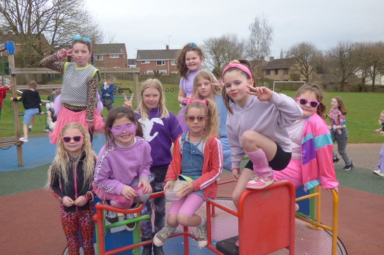 Some of the children from Landscore Primary School who rocked Neon 80s for Red Nose Day.
