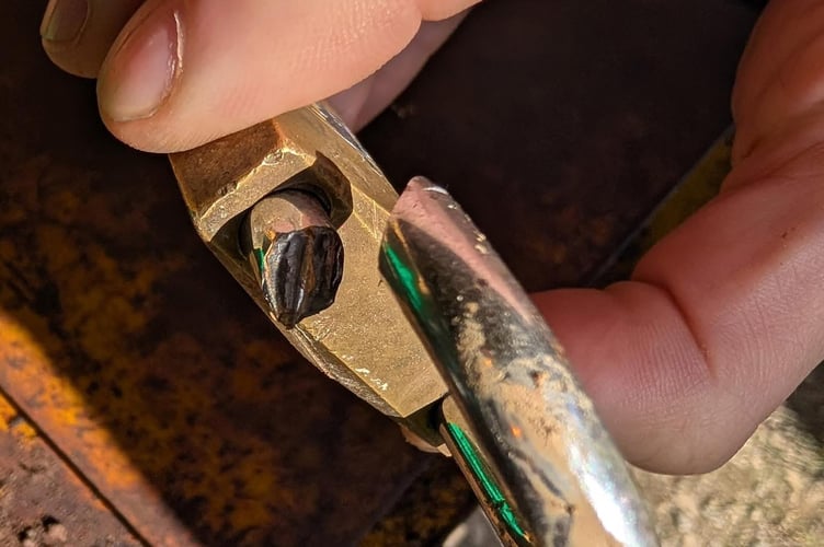 One of the broken padlocks at Bridestowe and Belstone Cricket Club.
