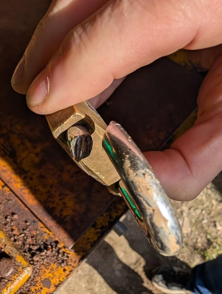 One of the broken padlocks at Bridestowe and Belstone Cricket Club.
