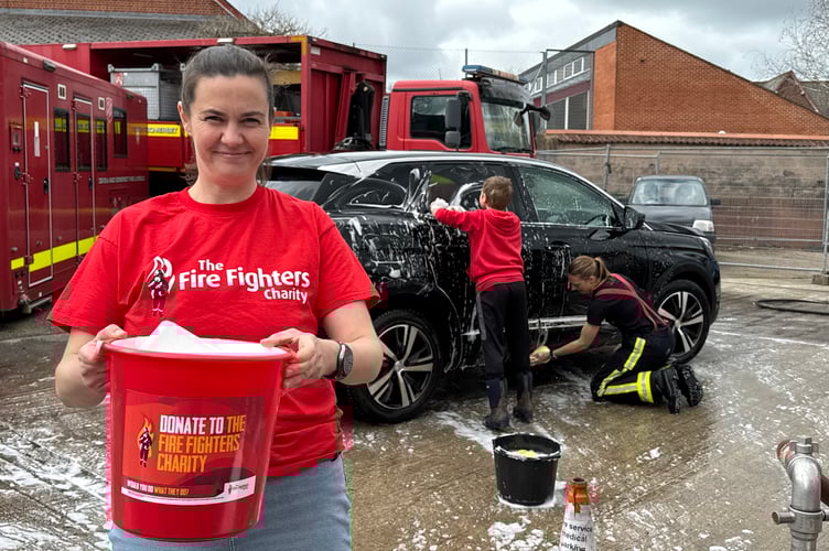 Natalie Searle from The Firefighters’ Charity helped at the car wash.  AQ 7610
