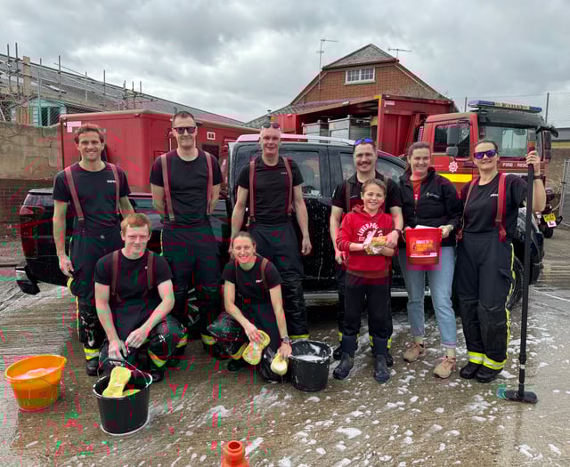Crediton firefighters car wash raised £733.09 for charity
