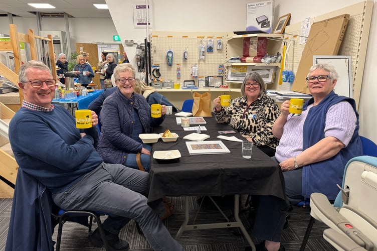 Enjoying a cuppa and chat at the Bake Sale.  AQ 7878
