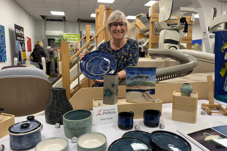 Ceramic Artist Anne Smith, pictured, and her husband, Phil, gave a percentage of the takings from their sales during the event to the charity.  AQ 7910
