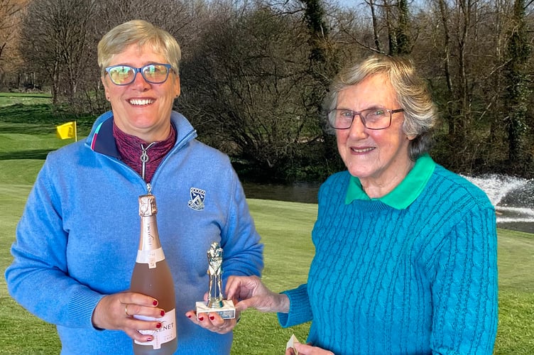Anne Woodger, left, being presented with the Ladies Section Winter League overall winner award by June Scuse.

