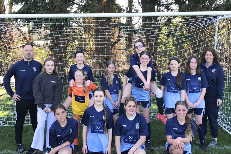 The U12 girls Blues side