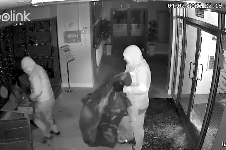CCTV still from Teignmouth Golf Club of the raid in progress