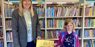 Hannah reads 100 books in library challenge