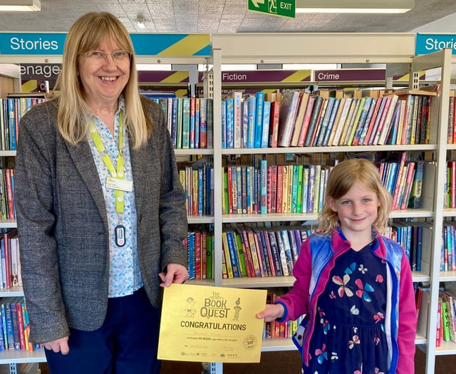 Hannah reads 100 books in library challenge