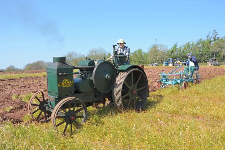 Geoff Parfitt from Bratton Clovelly was ploughing with his 1925 Rumely OilPull tractor built at LaPorte, Indiana, USA, Philip Uglow from Lewdown riding on and controlling the plough.  Image: David Parfitt
