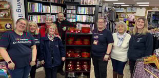 Devon Air Ambulance founder visits its Crediton charity shop
