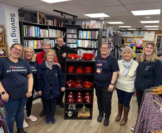Devon Air Ambulance founder visits its Crediton charity shop
