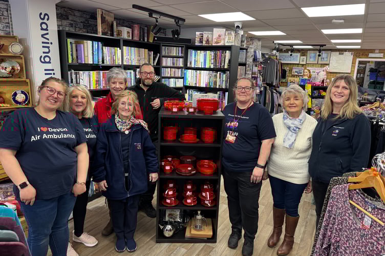 Ann Ralli, the founder and Life President of the Devon Air Ambulance Trust, recently paid a visit to the new DAA charity shop in Crediton High Street where she met volunteers, the manager Elise Waterston, some of the shoppers and those who donated items to the charity.  AQ 7411
