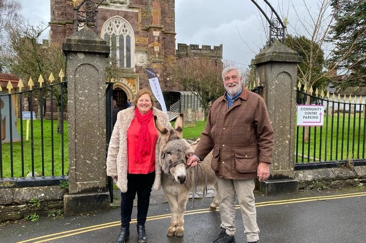 Issachar the donkey played an important role on Palm Sunday at an interactive church service, leading a procession through Bradninch to St Disen’s Church, followed by the church congregation.  Issachar belongs to Mike Britton, and his wife Rev Hazel Britton, who is the Curate at the church.
