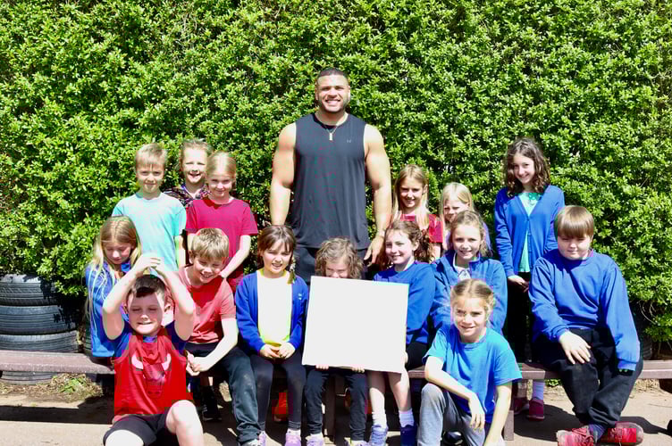 Mr George with pupils on Landscore student council