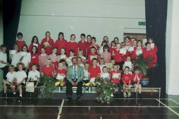 Hayward's School pupils were awarded certificates by Mayor Charlie Haydon for their floral decorated boots in July 2004. DSC01477