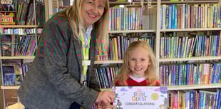 Amber reads 50 books in library challenge