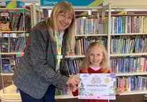 Amber reads 50 books in library challenge