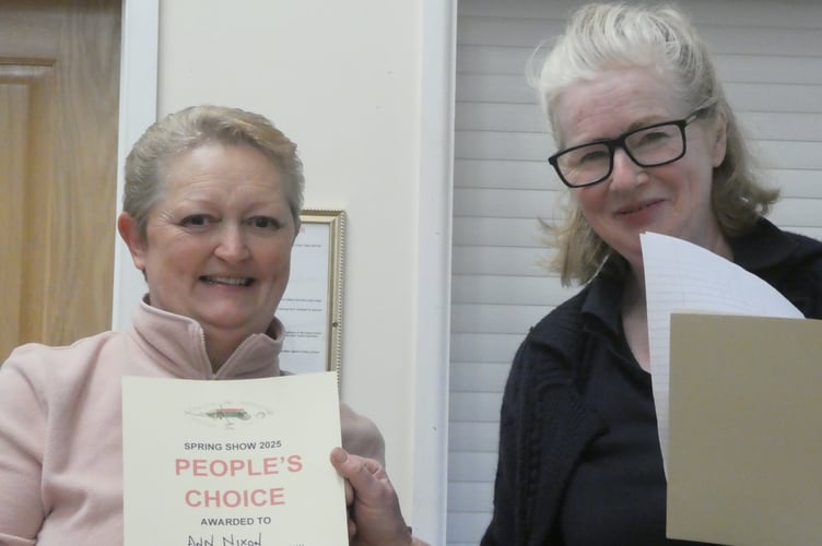 Show Secretary Charlotte Jakins awarding prize for Most Outstanding Floral Art Arrangement to Ann Nixon
