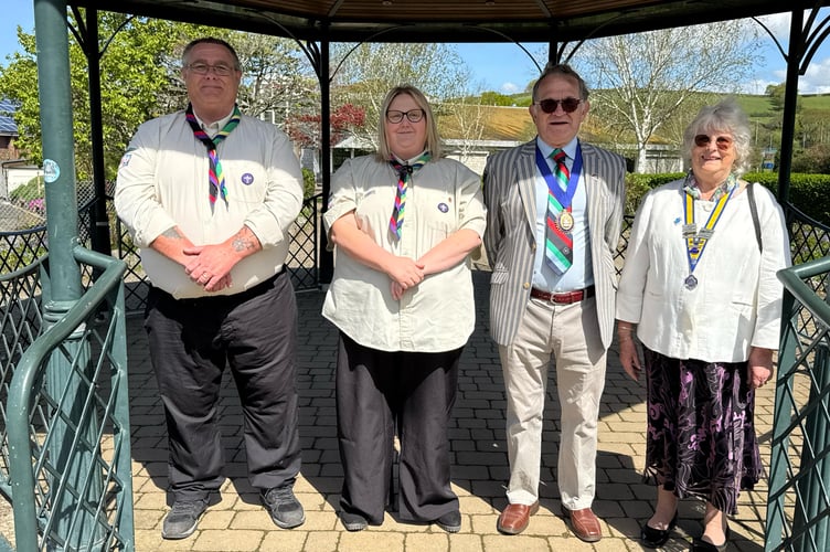 Taking the salute were District Commissioner Trevor Waycott and Assistant DC Jo Pengelly, Okehampton Mayor Allenton Fisher and President of the Inner Wheel Mrs Jean Fisher. AQ