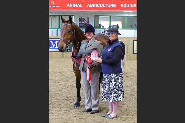 Emily and Arnie with judge Emma Jackson.

