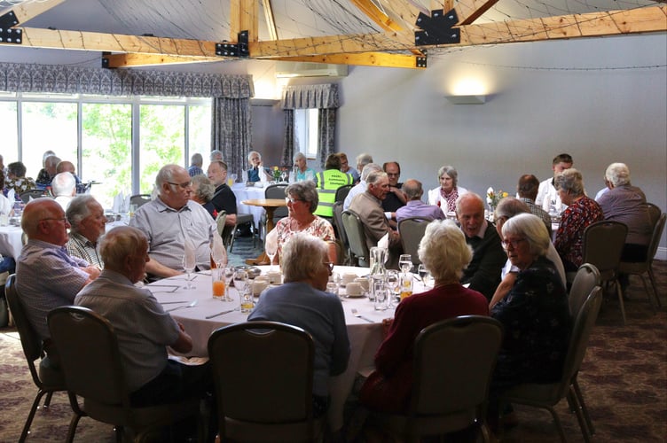 Members chatting before the meal