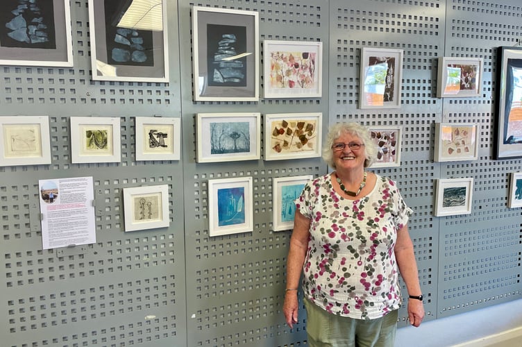 Artist Jane Innes with her Crediton Library exhibition