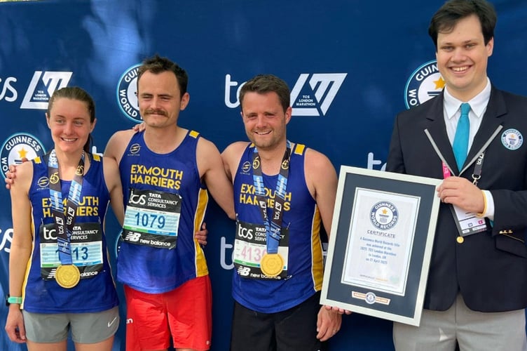 Alice, Sam and James receiving the official Guinness World Record certificate for Fastest Marathon By Three Siblings (Mixed).
