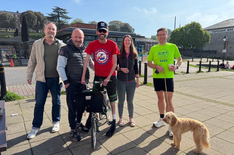Tom with representatives from one of his charity’s.  AQ 9445

