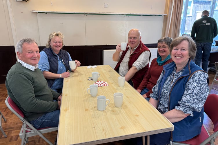 Enjoying a chat at Newton St Cyres YFC Big Breakfast at Sandford. AQ 9517