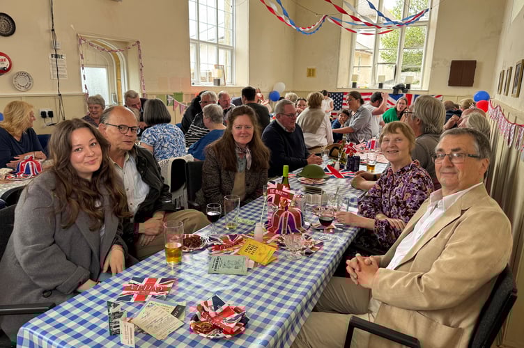 Plates cleared after a lovely VE Day 80 Bring and Share Street Party in Poughill Village Hall.  AQ 0542
