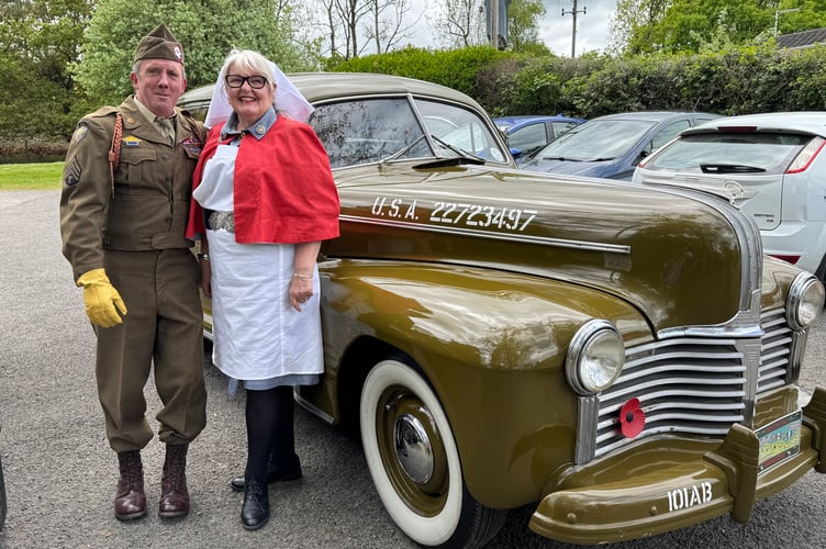 A local resident took along his vintage car, pictured with one of those who dressed as a wartime nurse.  AQ 0491
