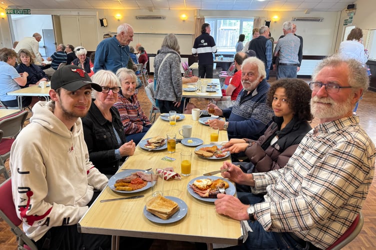 Tucking in at the Big Breakfast at Sandford Parish Hall. AQ 9502