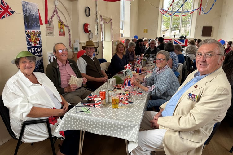 Waiting for the raffle after the Street Party in Poughill Village Hall.  AQ 0545
