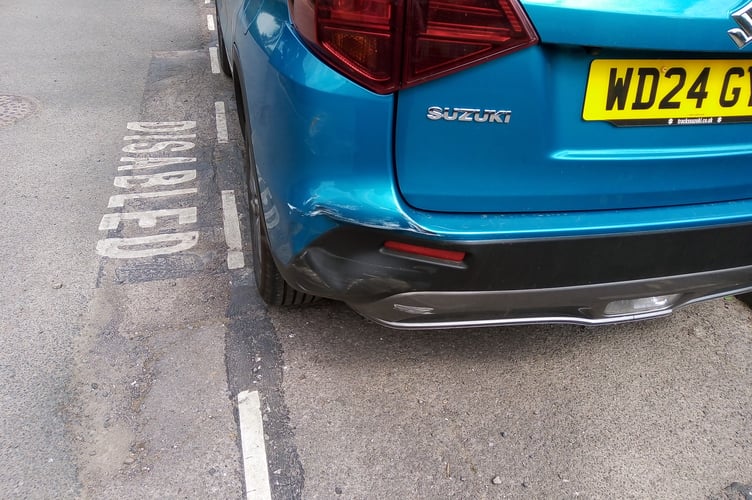 The car after it was struck by a white van in Courtis Gardens in Crediton.
