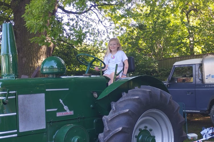 Haywards Primary School pupil Leelah enjoyed the vintage tractors
