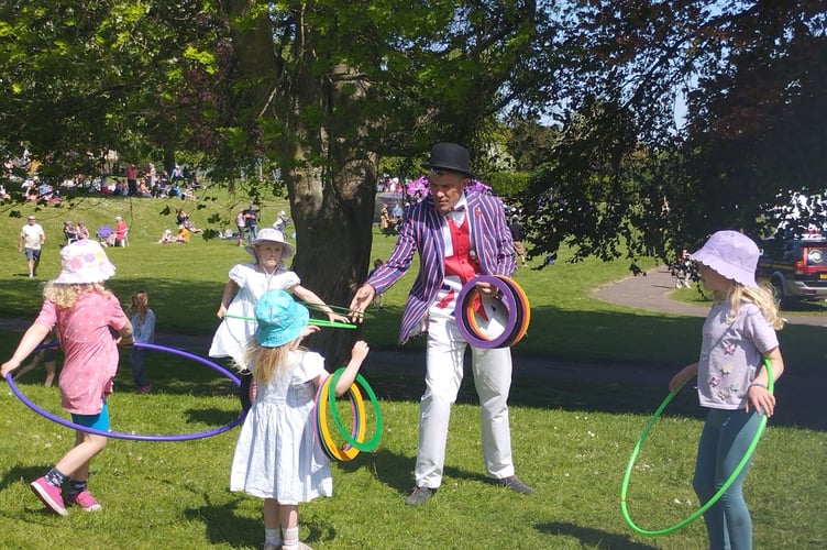 Rob Pudner dressed the part and children played with hoops