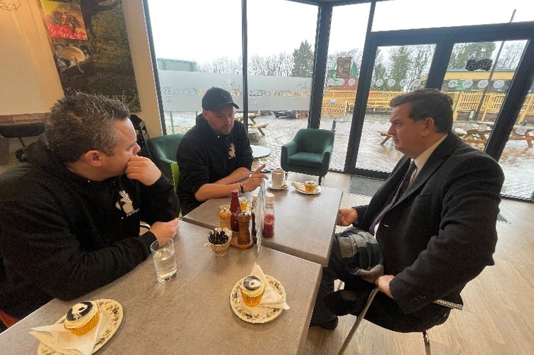 Steve Doyle and Simon Chudley chat with Central Devon MP, Mel Stride, right.
