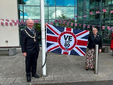 At the VE Day 80 ceremony at Tiverton, Cllr Gordon Czapiewski and Cllr Claudette Harrower.
