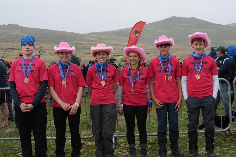 The Okehampton College ten tors team, from left, Tom, Abi, Ionie, Maisie, Ruby and Will with their medals after completing the 35-mile route.