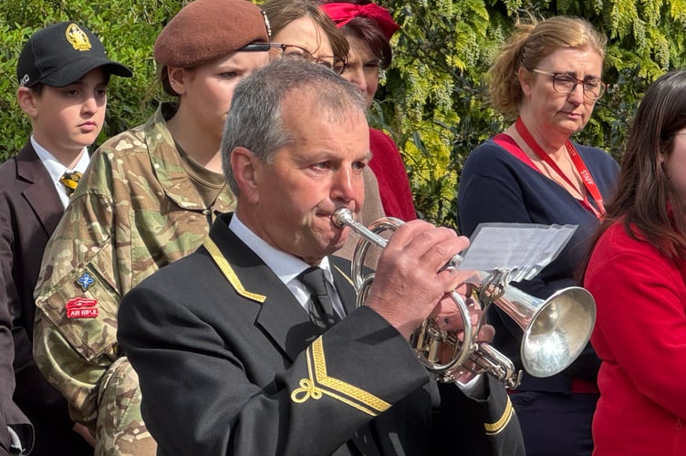 The Last Post was played by a member of Crediton Town Band. AQ 0807